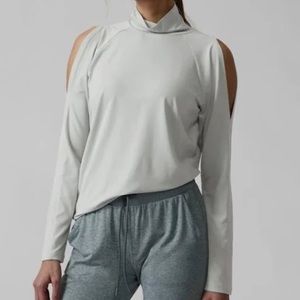 Athleta turtle neck light weight long sleeve, cold shoulder blouse.